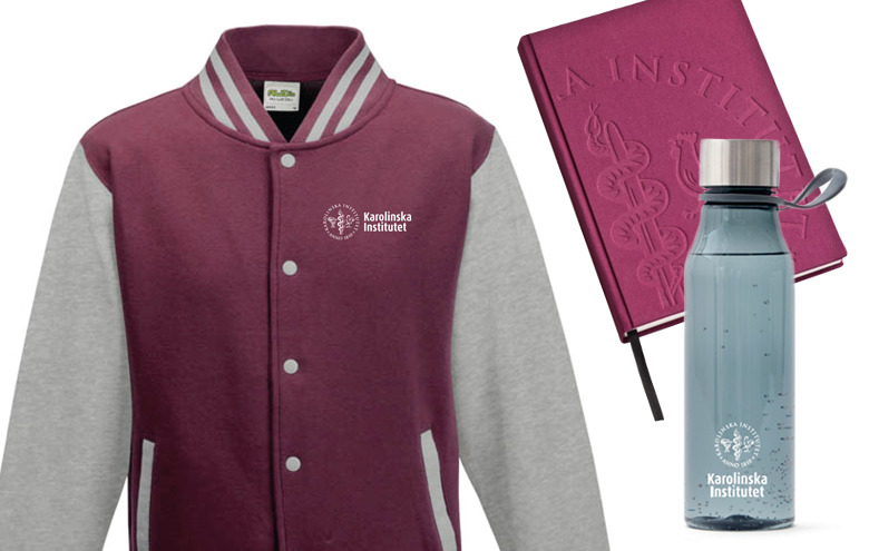 Baseball jacket, notebook and water bottle with the KI-logo.