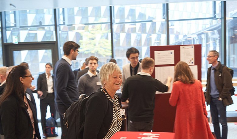 Pam Fredman mingles at the inauguration of AIMES in Biomedicum on 30 September 2020. People are seen in the background.