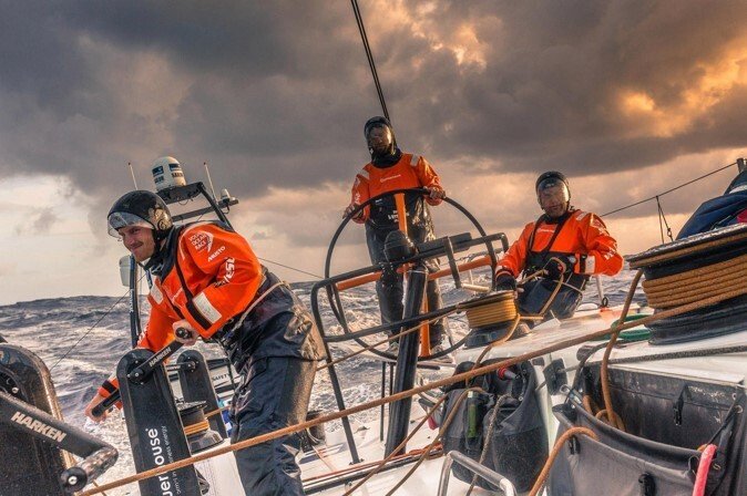 Crew on sailing boat