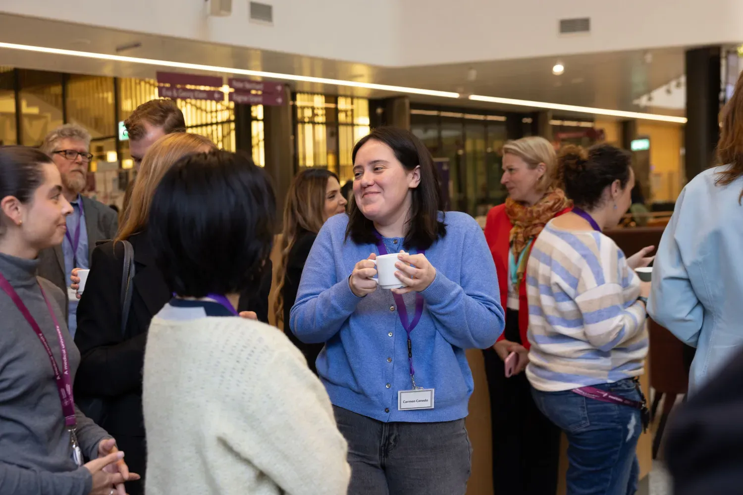 Participants mingle and talk at a Karolinska Institutet event.