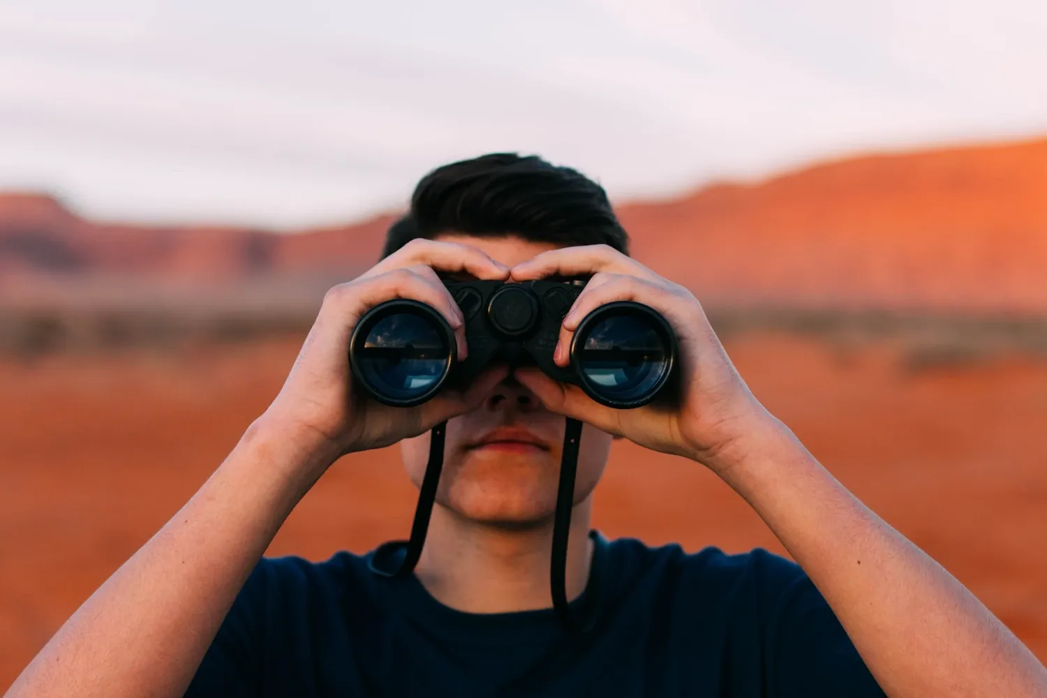 Man with binoculars.