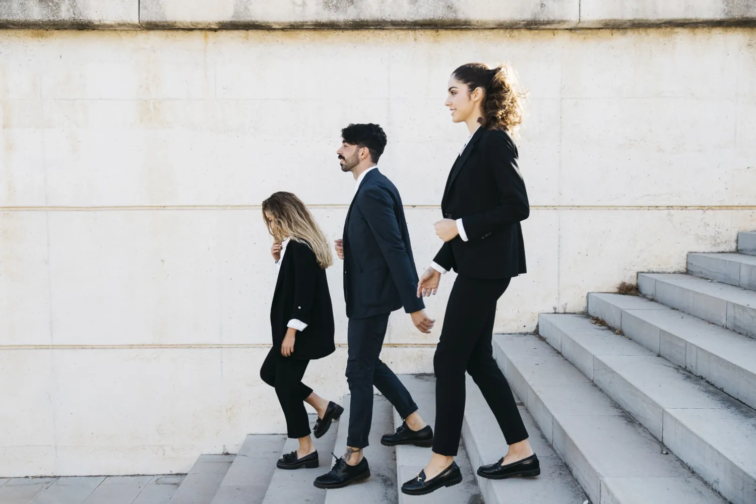 People walking down a staircase