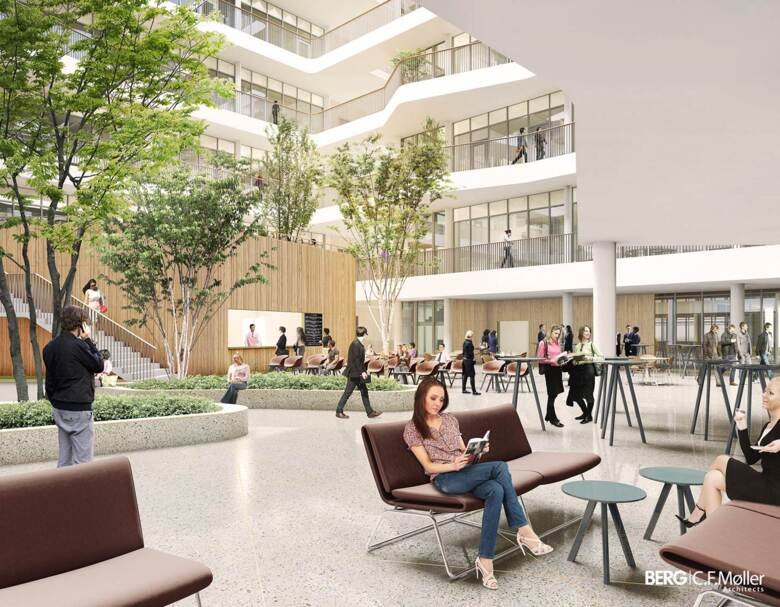 Atrium view of Biomedicum from entrance floor showing people sitting and on the move.