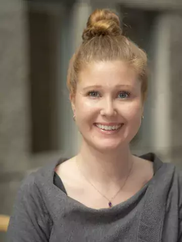 Profilbild på Carin Dahlberg i grå tröja